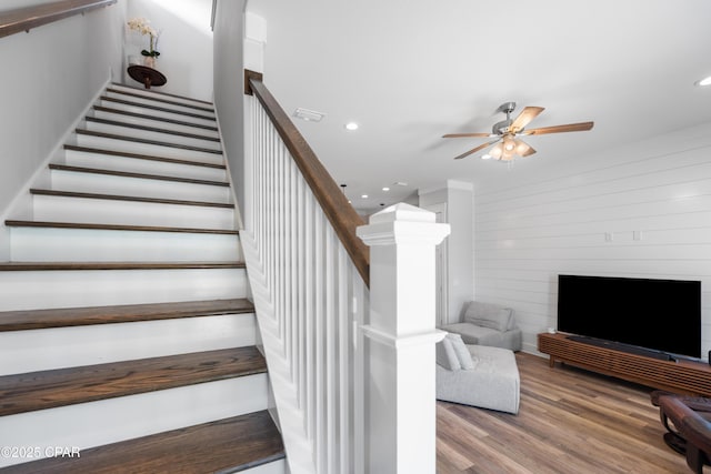 111 George C Wallace Blvd, Panama City Beach, FL 32413 - staircase featuring ceiling fan, wood finished floors, and recessed lighting