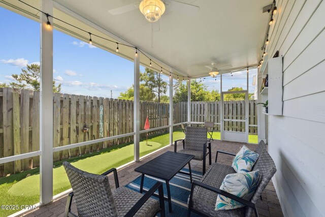 13 St. Vincent Lane, Inlet Beach, FL 32461 - sunroom with a ceiling fan and outdoor lounge area