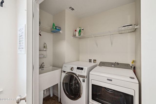 13 St. Vincent Lane, Inlet Beach, FL 32461 - washroom featuring washing machine and dryer and tile patterned floors