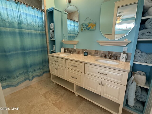 bathroom featuring double vanity and shower / bath combo