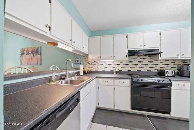kitchen featuring black range with electric stovetop, under cabinet range hood, a sink, dark countertops, and white cabinetry