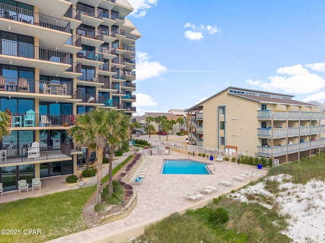 6905 Thomas Dr Unit 807, Panama City Beach, FL 32408 - community pool featuring a patio