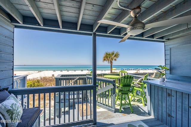17735 Front Beach Rd Unit 4, Panama City Beach, FL 32413 - balcony with a beach view, ceiling fan, and a deck with water view