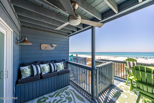 17735 Front Beach Rd Unit 4, Panama City Beach, FL 32413 - balcony featuring view of water and beach, ceiling fan, and an outdoor living space