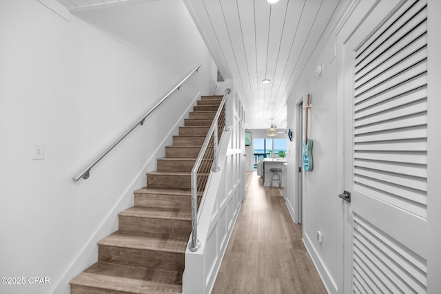 17735 Front Beach Rd Unit 4, Panama City Beach, FL 32413 - stairs with wood finished floors