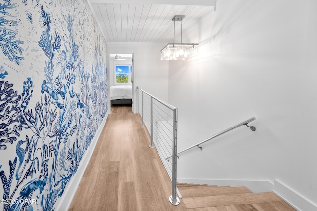 17735 Front Beach Rd Unit 4, Panama City Beach, FL 32413 - stairway with wood finished floors, baseboards, and wood ceiling