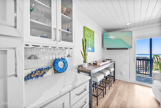 17735 Front Beach Rd Unit 4, Panama City Beach, FL 32413 - indoor dry bar with light wood finished floors and wood ceiling