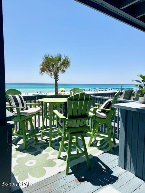 17735 Front Beach Rd Unit 4, Panama City Beach, FL 32413 - wooden terrace with a water view