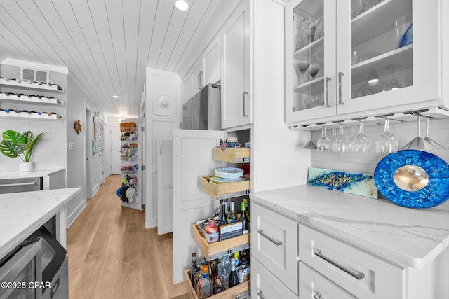 17735 Front Beach Rd Unit 4, Panama City Beach, FL 32413 - indoor dry bar featuring light wood-type flooring, recessed lighting, and wooden ceiling