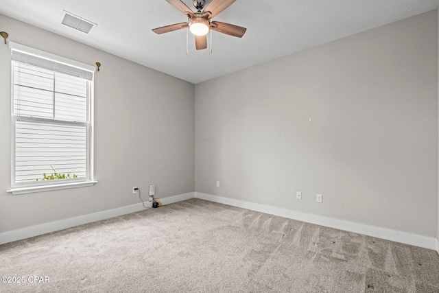 3104 Heartleaf E Ave, Panama City, FL 32405 - empty room featuring carpet, plenty of natural light, a ceiling fan, and baseboards