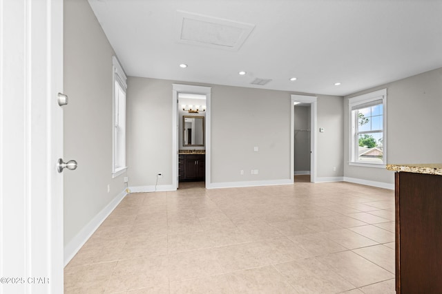3104 Heartleaf E Ave, Panama City, FL 32405 - spare room featuring recessed lighting, light tile patterned floors, and baseboards