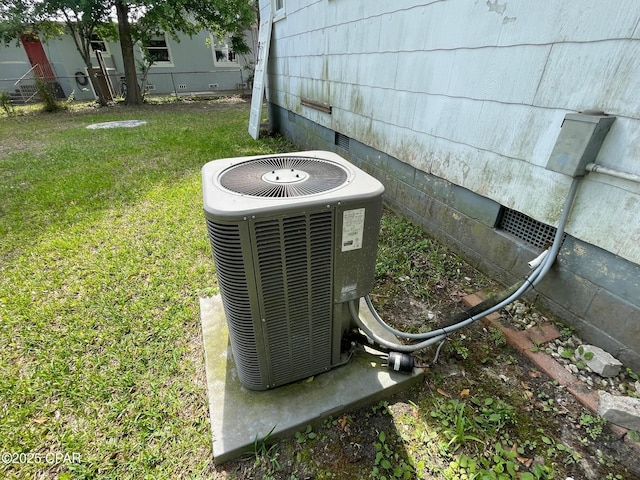 4276 2nd Ave, Marianna, FL 32446 - exterior view of central AC and crawl space