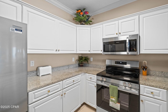 17545 Front Beach Rd Unit 1705, Panama City Beach, FL 32413 - kitchen with stainless steel appliances, crown molding, and white cabinets