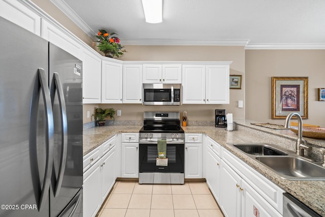 17545 Front Beach Rd Unit 1705, Panama City Beach, FL 32413 - kitchen with appliances with stainless steel finishes, a sink, crown molding, light tile patterned floors, and white cabinets