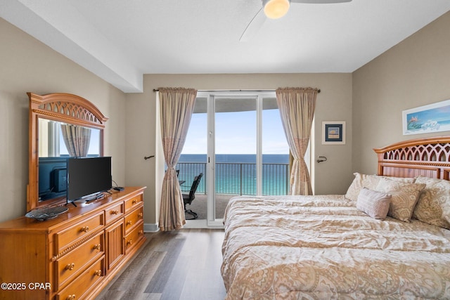 17545 Front Beach Rd Unit 1705, Panama City Beach, FL 32413 - bedroom with access to outside, dark wood-style floors, multiple windows, and a ceiling fan