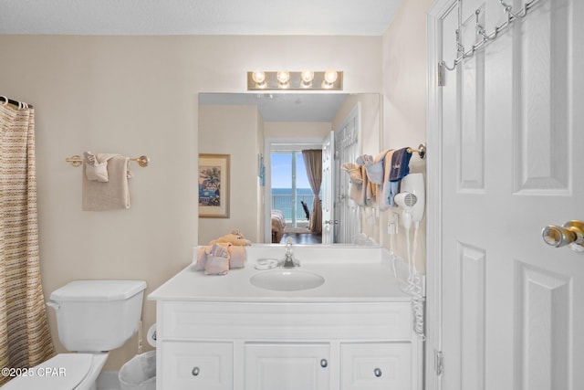 17545 Front Beach Rd Unit 1705, Panama City Beach, FL 32413 - bathroom with ensuite bath, toilet, and vanity