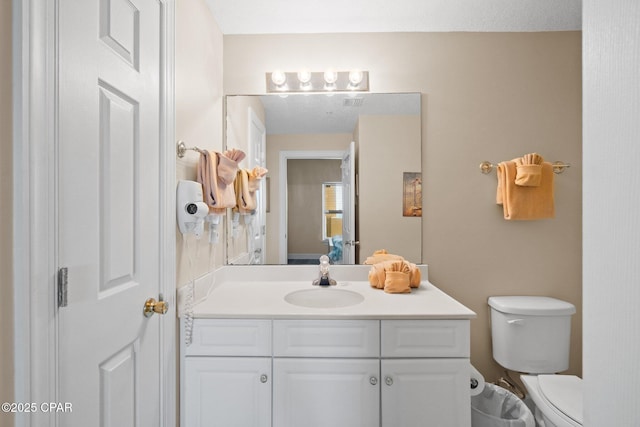 17545 Front Beach Rd Unit 1705, Panama City Beach, FL 32413 - half bathroom with vanity and toilet