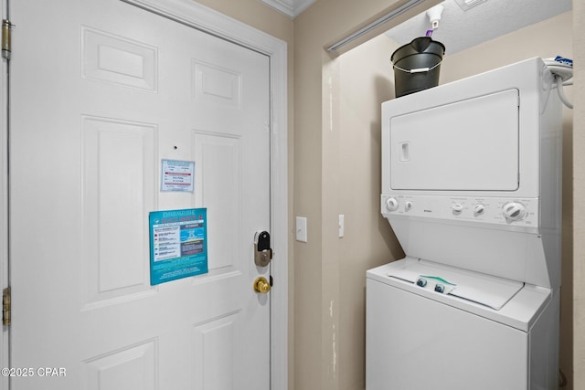 17545 Front Beach Rd Unit 1705, Panama City Beach, FL 32413 - laundry area featuring estacked washer and dryer