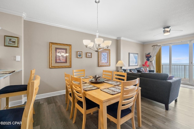 17545 Front Beach Rd Unit 1705, Panama City Beach, FL 32413 - dining room with wood finished floors, ornamental molding, a chandelier, a ceiling fan, and baseboards