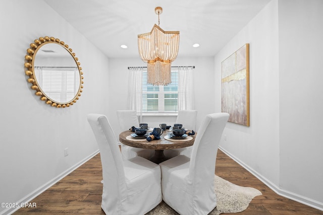 8676 Coral Reef Way, Panama City Beach, FL 32413 - dining space featuring a chandelier, baseboards, wood finished floors, and recessed lighting