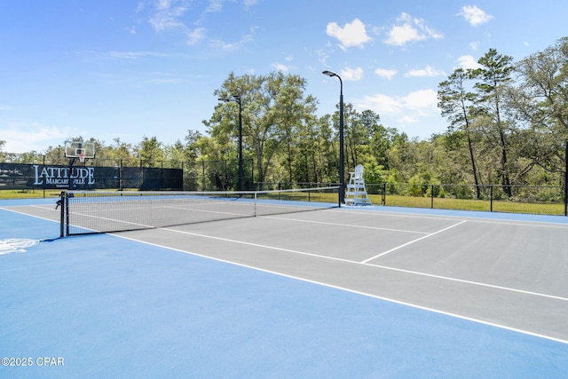 8676 Coral Reef Way, Panama City Beach, FL 32413 - view of tennis court featuring community basketball court and fence