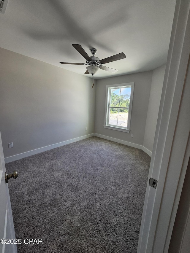 237 Skylah Ln Unit 19, Panama City Beach, FL 32407 - carpeted empty room with a ceiling fan and baseboards