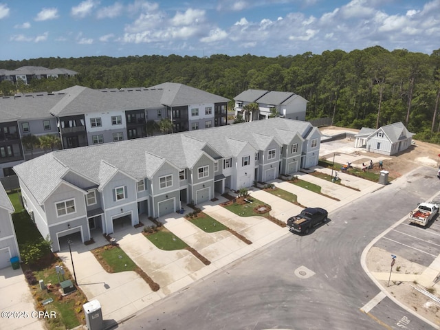 237 Skylah Ln Unit 19, Panama City Beach, FL 32407 - aerial perspective of suburban area featuring a forest