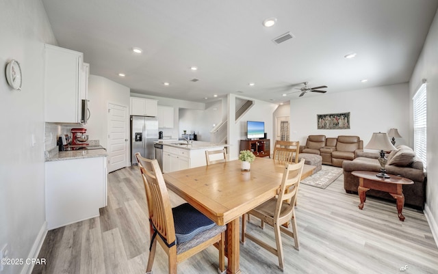 4862 Sweetspire Dr, Panama City, FL 32404 - dining space with light wood-style floors, ceiling fan, and recessed lighting