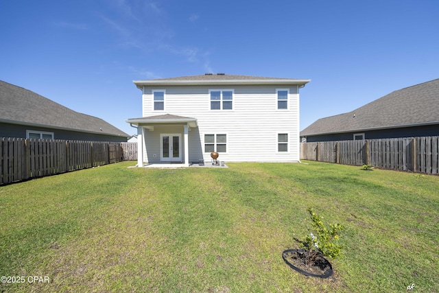 4862 Sweetspire Dr, Panama City, FL 32404 - back of property with french doors, a fenced backyard, and a patio