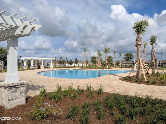 4862 Sweetspire Dr, Panama City, FL 32404 - community pool with a pergola and a patio