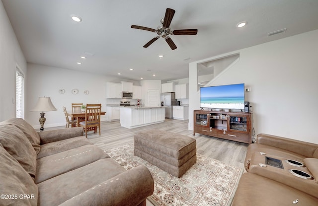 4862 Sweetspire Dr, Panama City, FL 32404 - living room with a ceiling fan, light wood finished floors, and recessed lighting
