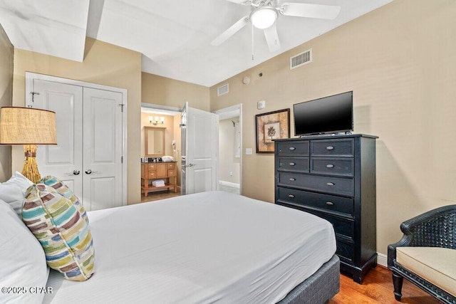 16701 Front Beach Rd Unit 306, Panama City Beach, FL 32413 - bedroom with a closet, wood finished floors, baseboards, and ceiling fan