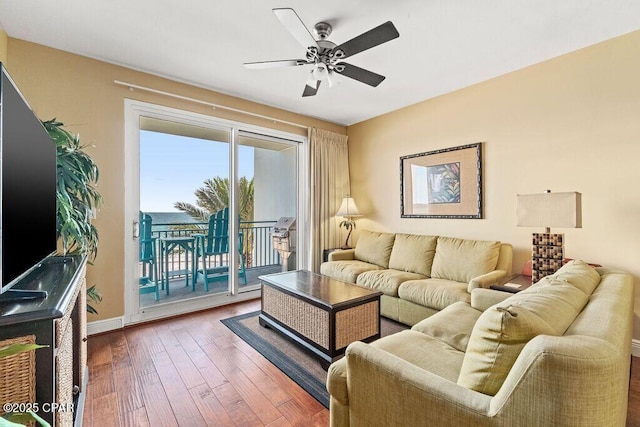 16701 Front Beach Rd Unit 306, Panama City Beach, FL 32413 - living area with hardwood / wood-style floors, ceiling fan, and baseboards