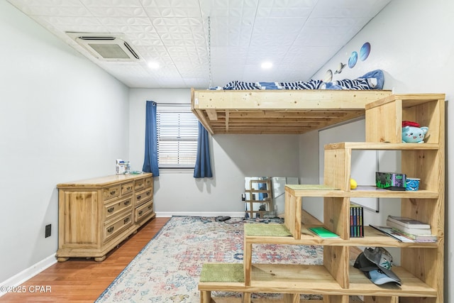 2322 Silversides Loop, Pensacola, FL 32526 - bedroom featuring baseboards, light wood-style flooring, and recessed lighting