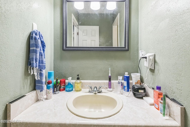 2322 Silversides Loop, Pensacola, FL 32526 - bathroom featuring vanity and a textured wall