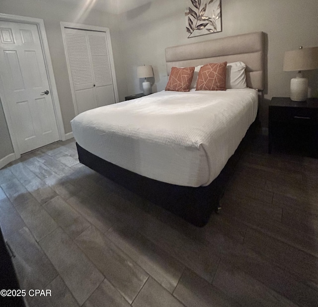 bedroom featuring wood finished floors