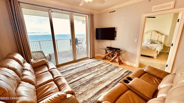 17643 Front Beach Rd Unit 1704, Panama City Beach, FL 32413 - living room with a ceiling fan, crown molding, healthy amount of natural light, and baseboards