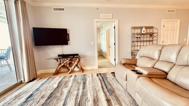 17643 Front Beach Rd Unit 1704, Panama City Beach, FL 32413 - living area featuring crown molding, tile patterned floors, baseboards, and healthy amount of natural light