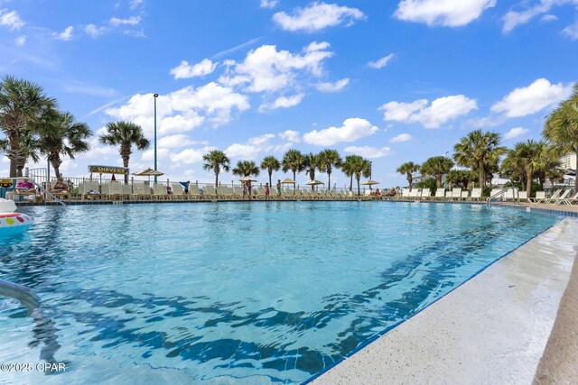 8743 Thomas Dr Unit 1211, Panama City Beach, FL 32408 - community pool featuring fence