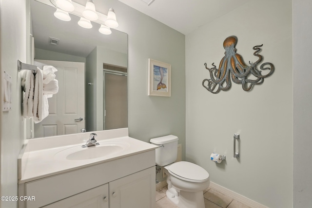 1515 SE Miracle Strip Pkwy Unit 609, Fort Walton Beach, FL 32548 - full bath with toilet, tile patterned floors, vanity, an enclosed shower, and baseboards