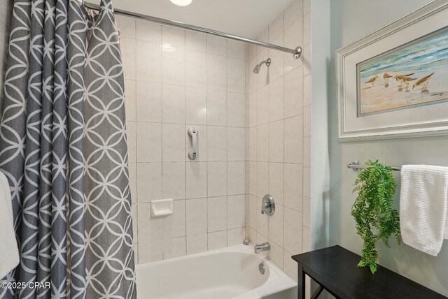 1515 SE Miracle Strip Pkwy Unit 609, Fort Walton Beach, FL 32548 - full bathroom featuring shower / bath combo with shower curtain