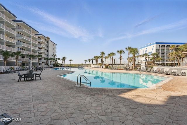 1515 SE Miracle Strip Pkwy Unit 609, Fort Walton Beach, FL 32548 - community pool featuring a patio area