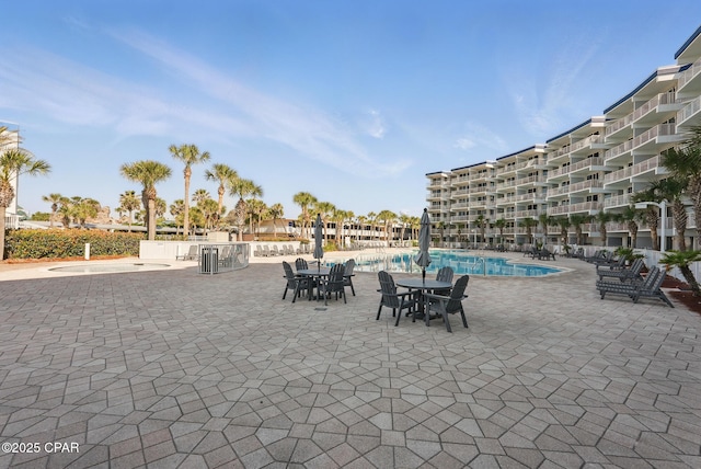 1515 SE Miracle Strip Pkwy Unit 609, Fort Walton Beach, FL 32548 - community pool featuring a patio area and a hot tub