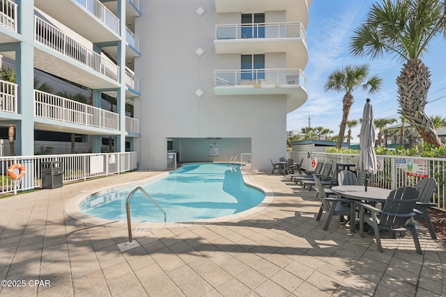 1515 SE Miracle Strip Pkwy Unit 609, Fort Walton Beach, FL 32548 - community pool featuring a patio