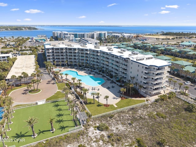 1515 SE Miracle Strip Pkwy Unit 609, Fort Walton Beach, FL 32548 - aerial view of a pool area, a large body of water, and apartment complex