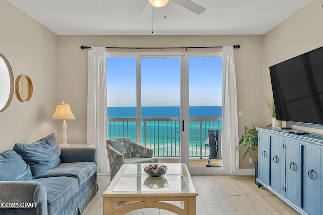 15817 Front Beach Rd Unit 2-2108, Panama City Beach, FL 32413 - living room with ceiling fan, healthy amount of natural light, and light wood-style floors