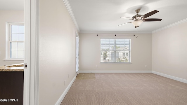76 Mosaic Oaks Cir, Santa Rosa Beach, FL 32459 - empty room featuring ornamental molding, a ceiling fan, light colored carpet, and baseboards