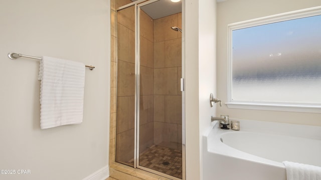 76 Mosaic Oaks Cir, Santa Rosa Beach, FL 32459 - full bathroom featuring a shower stall, a garden tub, and healthy amount of natural light