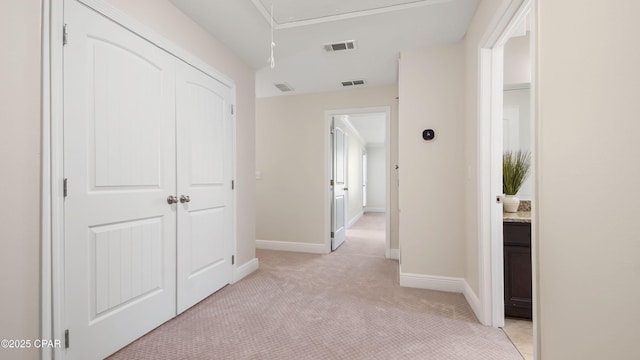 76 Mosaic Oaks Cir, Santa Rosa Beach, FL 32459 - corridor featuring attic access, light colored carpet, and baseboards