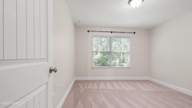 76 Mosaic Oaks Cir, Santa Rosa Beach, FL 32459 - unfurnished room with baseboards and light colored carpet